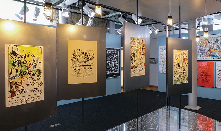 (c)Quartier Libre SIG, Plus que quelques jours pour aller voir à Quartier Libre, le premier volet de l’exposition consacrée aux affiches d’un incontournable couple d’artistes de la deuxième moitié du XXème siècle: Jean Tinguely et Niki de Saint Phalle. Dès le 23 juin les œuvres de Tinguely céderont la place à celles de l’artiste franco-américaine qui habilleront l’esp
